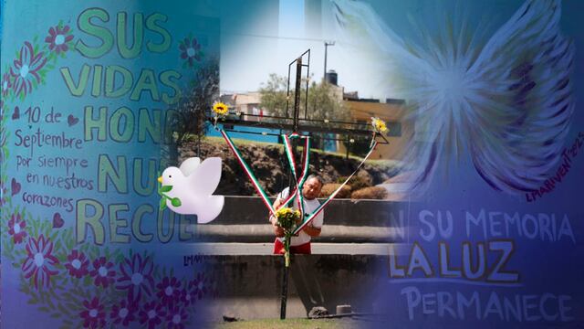 Vecinos colocan cruz en memoria de vícimas de la explosión en Iztapalapa.