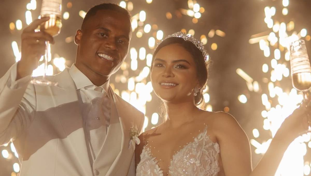 Jhon Arias y su esposa