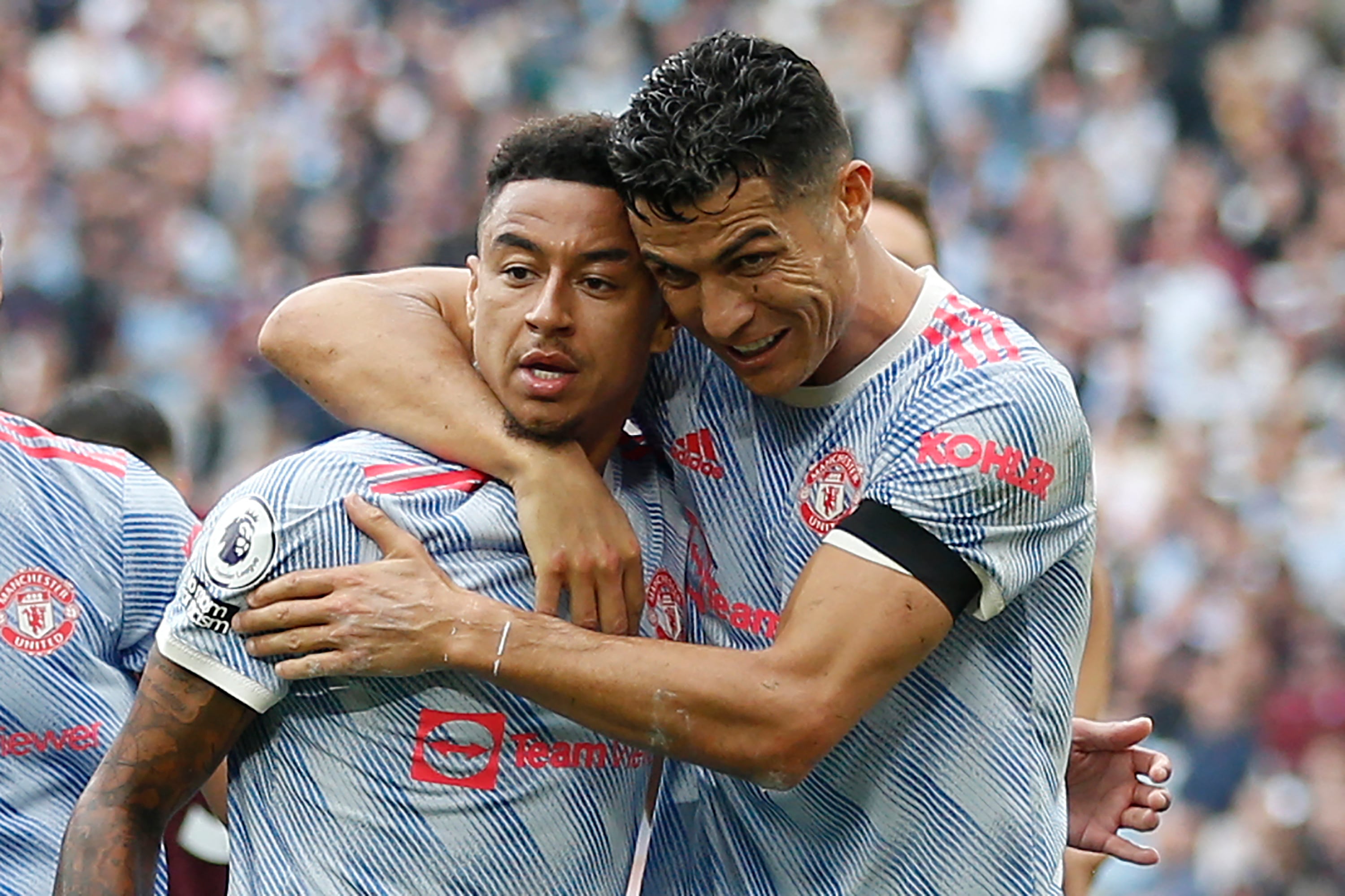 Cristiano Ronaldo y Jesse Lingard