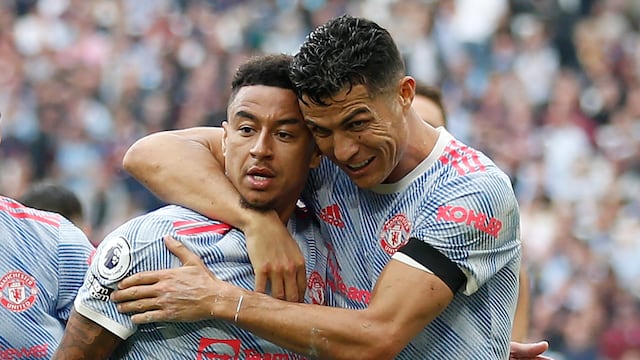 Cristiano Ronaldo y Jesse Lingard