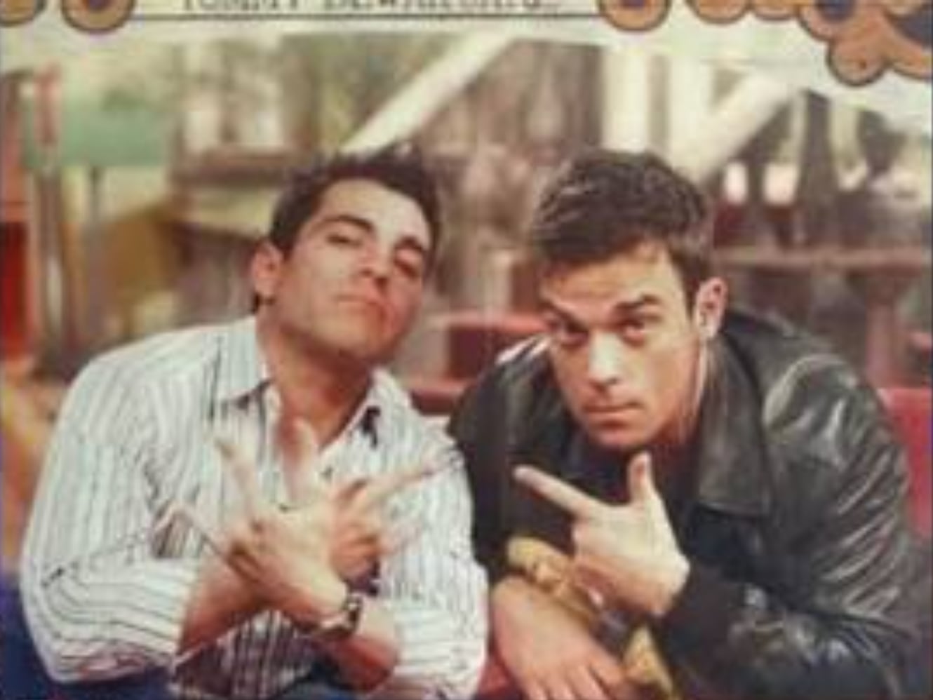 Omar Chaparro y Robbie Williams