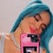 Karol G se quita los tatuajes que se hizo con Anuel AA, días después de que él cubriera los suyos (VIDEO)