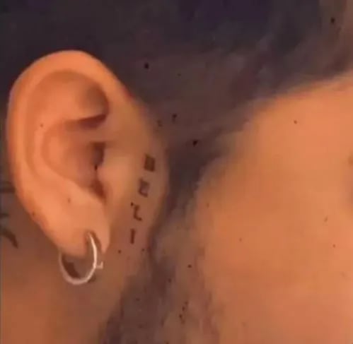 Los 4 tatuajes de Christian Nodal sobre Belinda