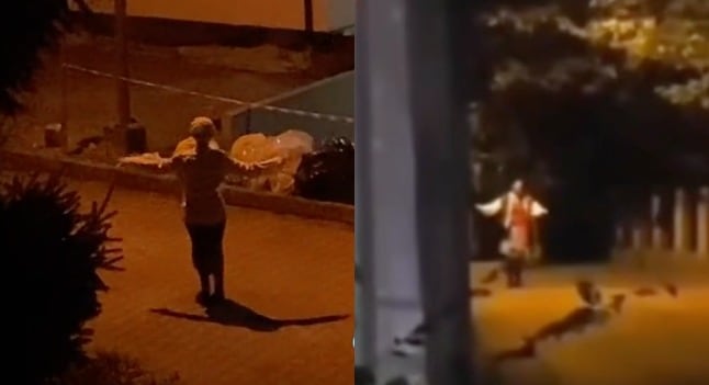 Mujer que baila en la oscuridad