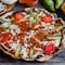 ¿Qué es una tlayuda de Oaxaca? Te contamos sobre este delicioso manjar