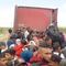 VIDEO: migrantes viajan hacinados y sin protección alguna en la plataforma de un tráiler; se dirigen a la frontera