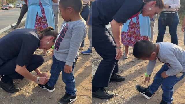 Claudia Sheinbaum  abrochándole las agujetas a un niño durante su visita a Oaxaca