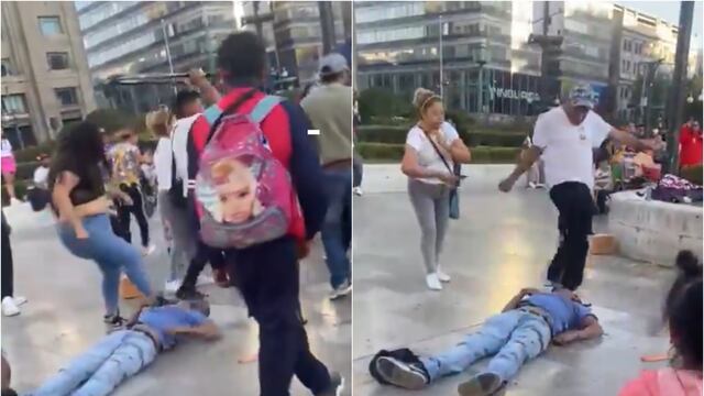 Pelea entre vendedores ambulantes enfrente de Bellas Artes