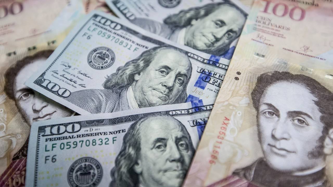 Bolívar y dólar