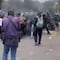 Manifestantes y policías se enfrentan cerca del Estadio Banorte sobre Avenida del Imán