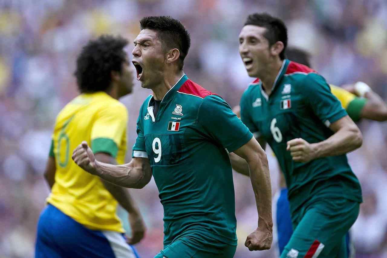 Oribe Peralta y Héctor Herrera