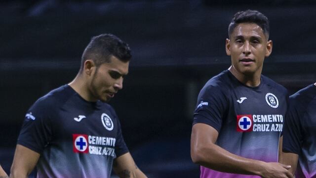 Orbelín Pineda y Luis Romo