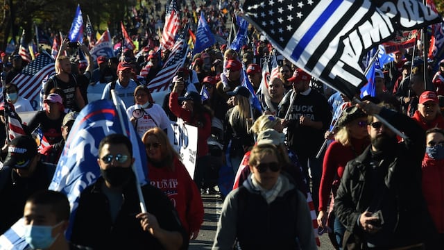 Supporters of US President Donald Trump rally in Washington, DC, on November 14, 2020. - Supporters are backing Trump's claim that the November 3 election was fraudulent. (Photo by Olivier DOULIERY / AFP)