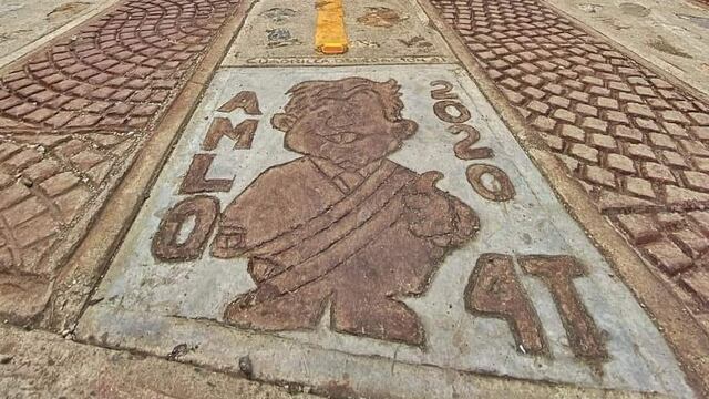 Dibujo de AMLO en carretera