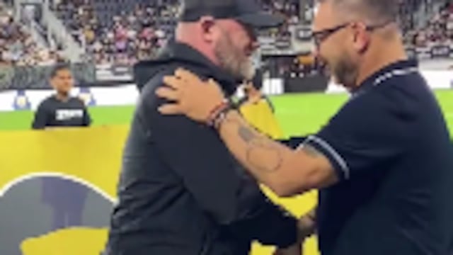 Wayne Rooney y Turco Mohamed