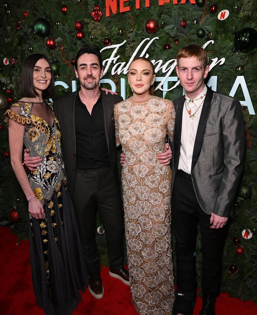 Lindsay Lohan y sus hermanos en la premier de la película Navidad de Golpe de Netflix