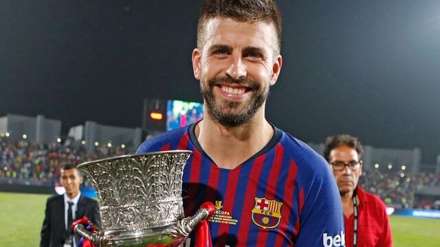 Piqué celebrando un título con el Barça