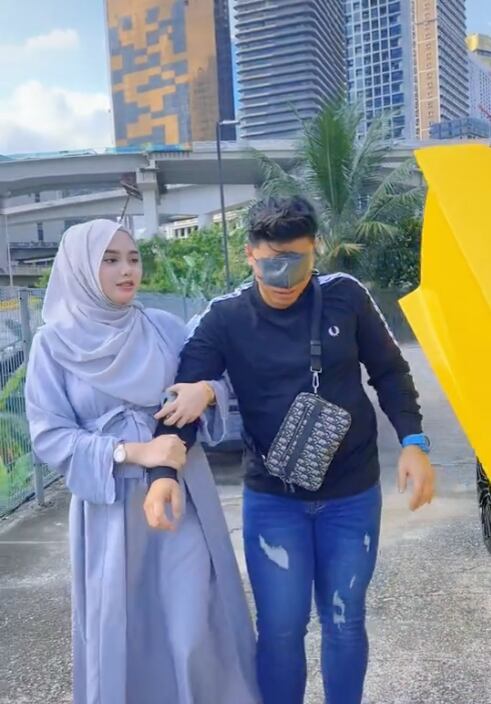 Anes Ayuni Osman y su esposo