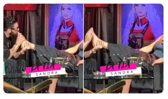 Poncho de Nigris le da un beso a los pies a Wendy Guevara para su podcast