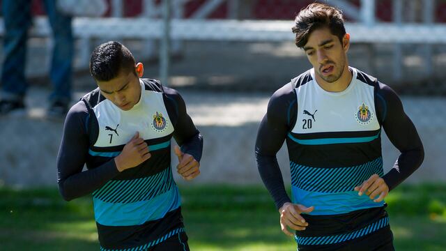 Orbelín Pineda y Rodolfo Pizarro