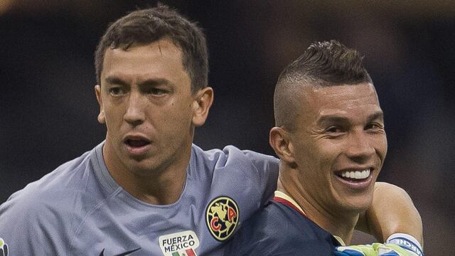 Agustín Marchesín y Mateus Uribe.