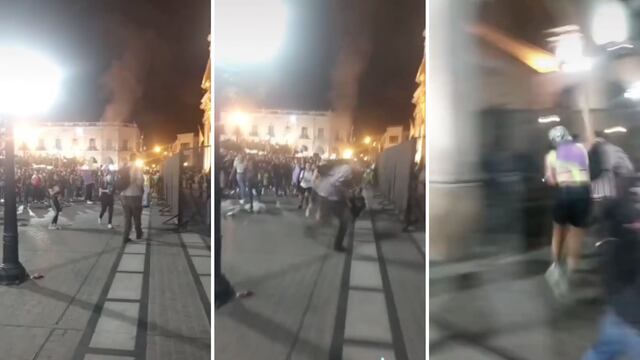 captura de video, hombre golpea a una mujer en marcha feminista en Argentina