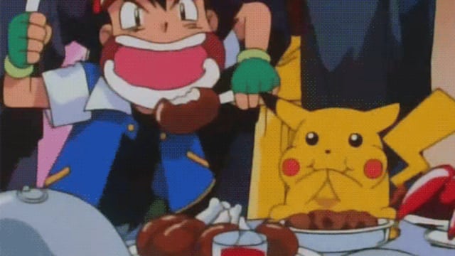 Ash de Pokémon comiendo