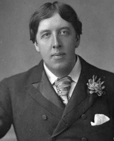 Oscar Wilde con un clavel verde