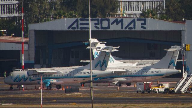Aspectos de aviones de la aerolínea Aeromar en las inmediaciones del AICM.